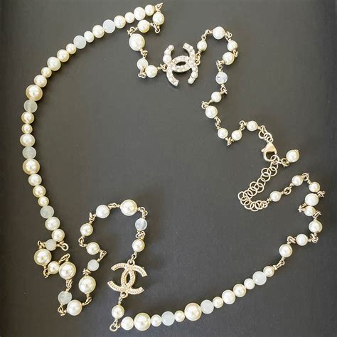 chanel long pearl necklace fake|chanel pearl necklace retail price.